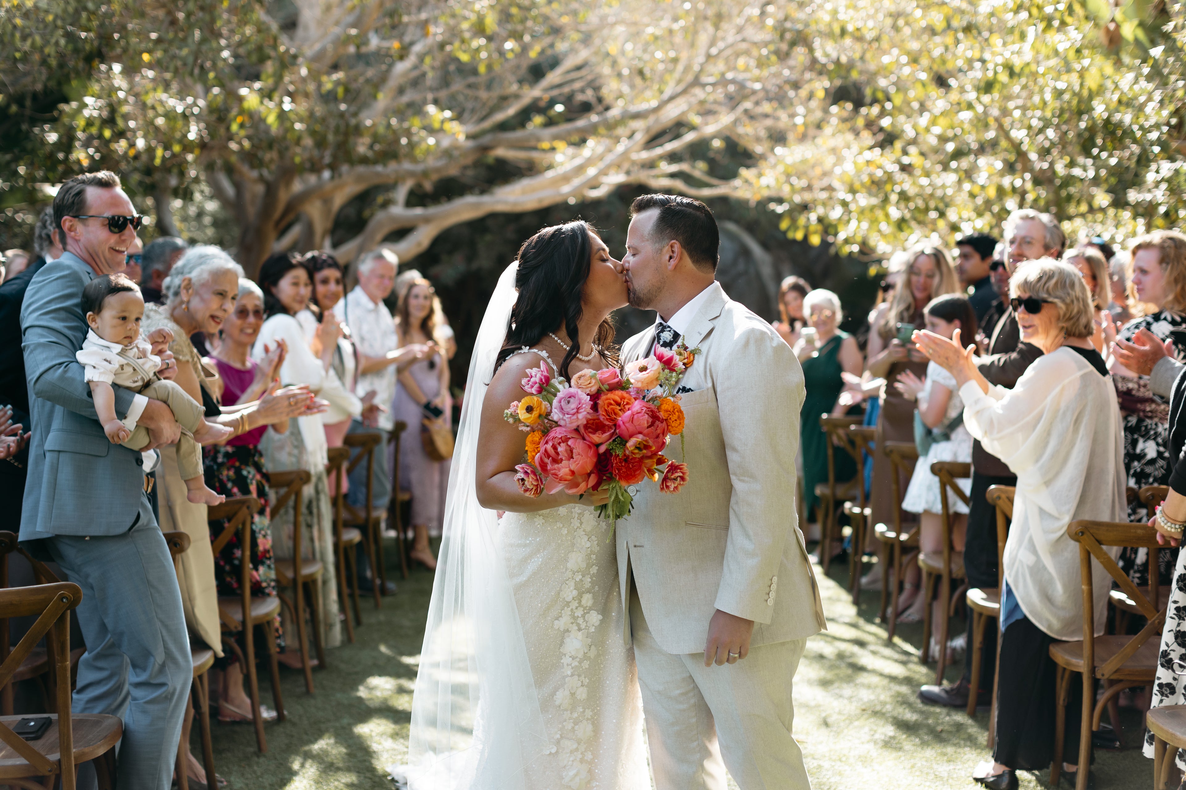 Wedding Bouquet colorful vibrant sunset pink. At botanica oceanside wedding florist